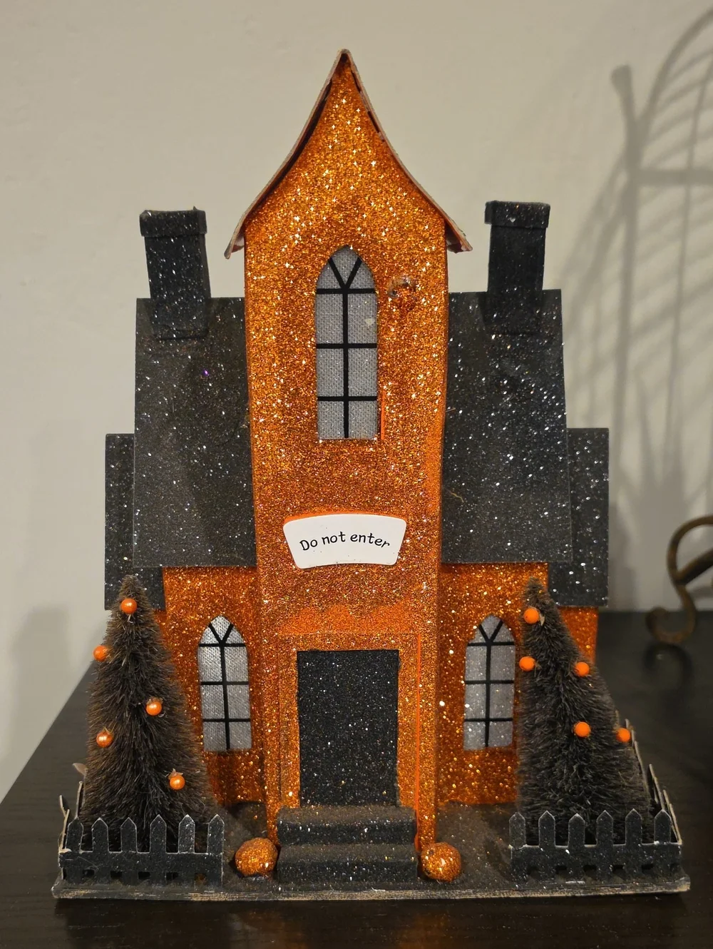 Glittery Orange & Black Haunted House Décor